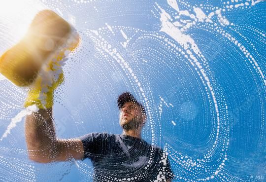 stock photo window cleaner with sponge cleaning glass window cleaning conept image 240
